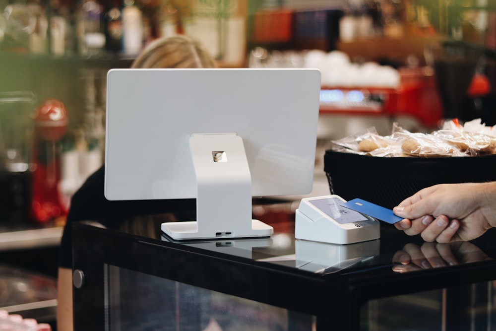 Customer paying with a card at checkout