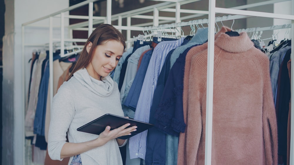 Store staff member reviewing inventory on a tablet